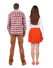 Back view of couple. beautiful friendly girl and guy together.