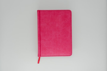 Pink organizer on a white background close-up
