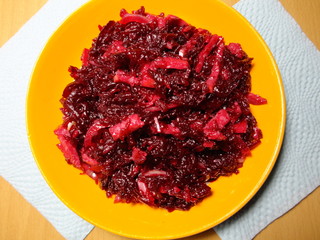 Boiled beet salad on a plate.