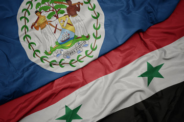 waving colorful flag of syria and national flag of belize.