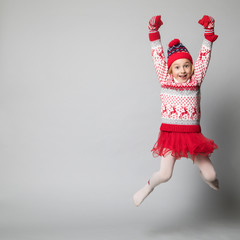 Little girl in winter look. Christmas concept.