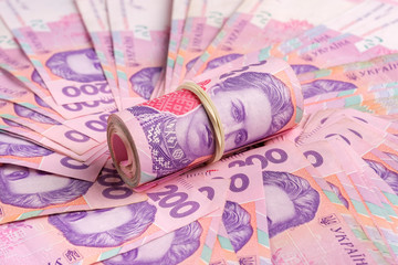 Ukrainian national currency, banknotes value of 200 hryvnia and bundle 200 UAH.