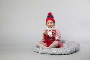 Little girl in winter look. Christmas concept.