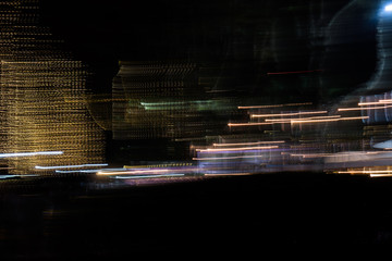 Abstract futuristic line night lights stripes in motion texture motion over dark ultra wide background. blurred lines moving fast