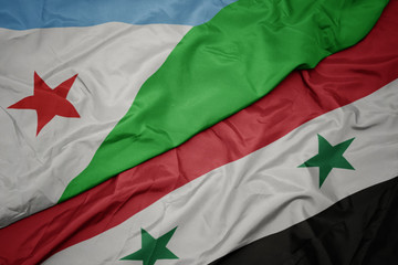 waving colorful flag of syria and national flag of djibouti.