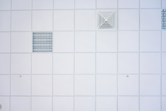 Squared background concept in white. Photo of the ceiling in the building.
