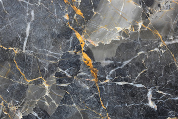 Patterned natural of dark gray marble pattern (Russia Gold) for design.