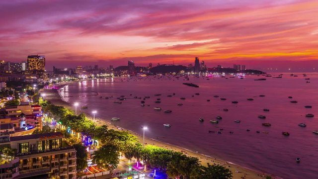 4K Timelapse Aerial top view of of Pattaya beach in the evening and beautiful sunset sky 