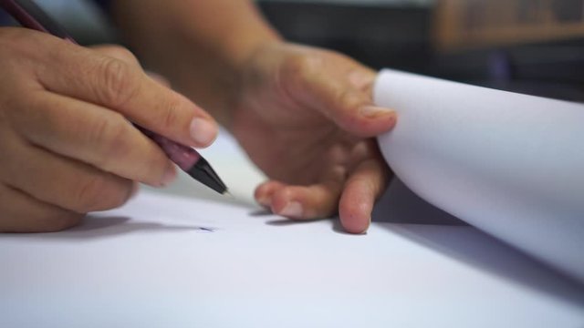 Document Report and business busy Concept: Businessman Manager hands holding green pen for checking and signing white documents reports papers of paper files in modern office and people background.