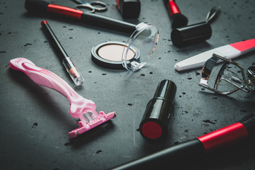 Set of woman make up cosmetics on stone background. Beauty and fashion concept. On table lies...