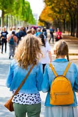 Two teenage girl walking on Champs-Élysées