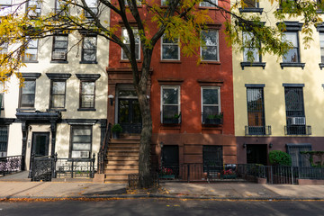 Fototapeta na wymiar Row of Colorful Old Brick Homes in the East Village of New York City