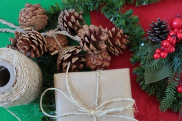 christmas composition with cones and candle