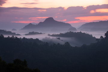 Mountain view on the morning with sunrise and sea of fog.