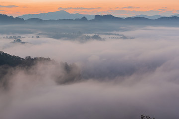 Mountain view on the morning with sunrise and sea of fog.