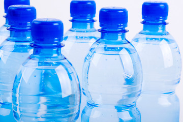 Bottles of water in blue tone