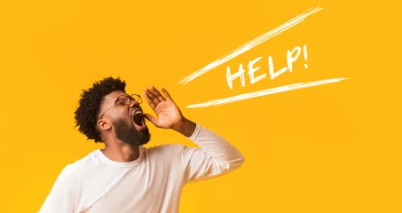 Fotobehang Worried afro guy shouting help over orange background © Prostock-studio