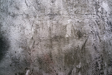 cracked and peeling paint and grunge old wall with texture