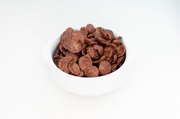 Bowl of cereals for breakfast on white background