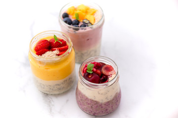 Chia pudding and fresh fruit smoothie, mango, berry, cherry