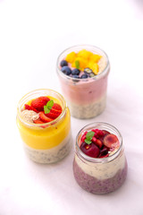 Chia pudding and fresh fruit smoothie, mango, berry, cherry