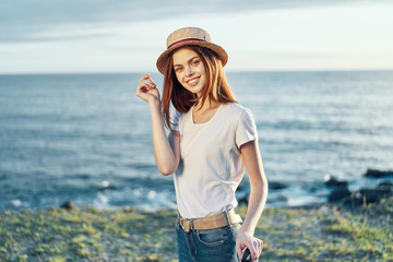 woman in hat on beach