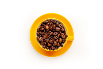 yellow cup of coffee with fried beans on white  background, isolate.
