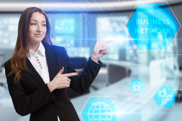 Business, Technology, Internet and network concept. Young businessman working on a virtual screen of the future and sees the inscription: Business network