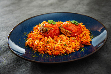 Stuffed tomatoes and rice with tomato