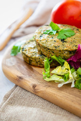 Fototapeta na wymiar Vegetarian food Wheat Gluten Steaks with spinach