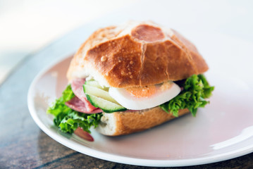 Sandwich with bacon - chicken, cheese and lettuce