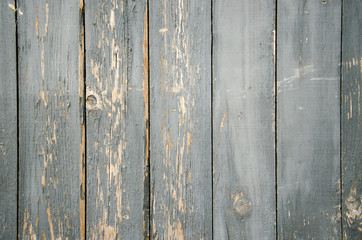 Antique gray-blue wooden background. Background made with elements of peeling paint