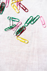 a group of colorful paper clips textured on white background