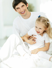 Obraz premium portrait of handsome father with his little daughter.