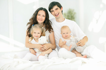 Fototapeta premium background image of a young happy family.