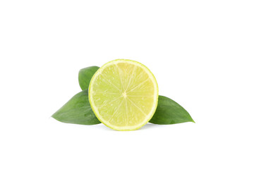 Half of lime with leaves isolated on white background. Juicy fruit
