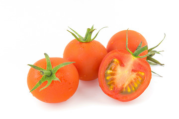 Red fresh tomatoes isolated on white background