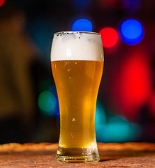 Cold beer like with party type lights background