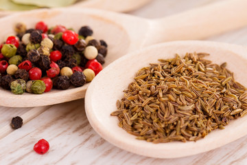 Mixed spices on the wooden spoons