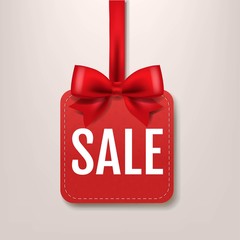 Red Paper Sale Label With Red Silk Ribbon Grey Background