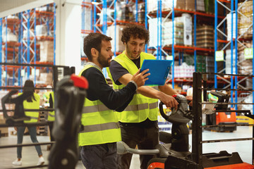 Training on a forklift, managers and workers	