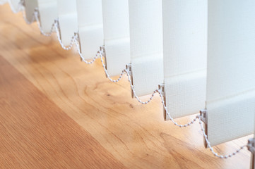 Vertical blind for the office room decoration.