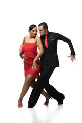 elegant, graceful couple of dancers performing tango on white background