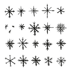 Set of hand drawn scribble ink black snowflakes isolated on white background.