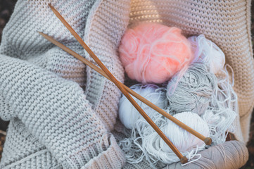 Fototapeta na wymiar Threads for knitting closeup. Knitting as a hobby. Accessories for knitting