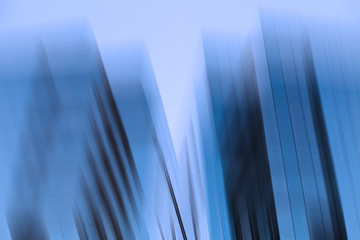 Abstract business modern city urban futuristic architecture background, motion blur, reflection in...