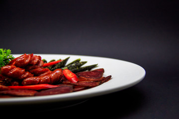 Plate of sun-dried sausages. Mahan, wasabi, chili