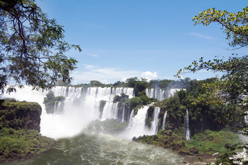 Fototapeta premium San Martin Island and Iguazu Falls on background