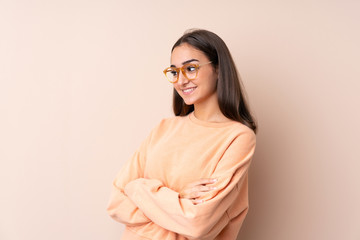 Obraz premium Young girl over isolated background looking to the side