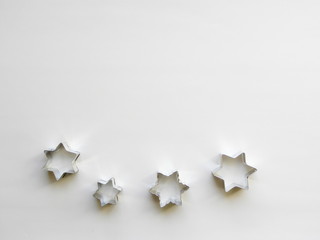 stainless steel molds for baking christmas cookies. Stars  isolated on white background